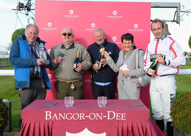 Happy Owners and jockey Nico de Boinville collecting their prize